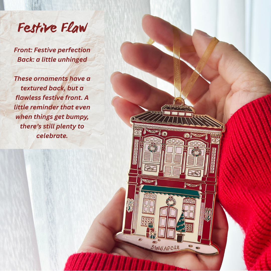 Enamel ornament featuring singapore shophouse